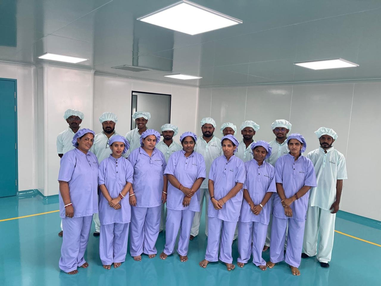 Bioanthem Devices production team in cleanroom uniforms